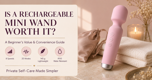Pink rechargeable mini wand massager in a tasteful private self-care setting