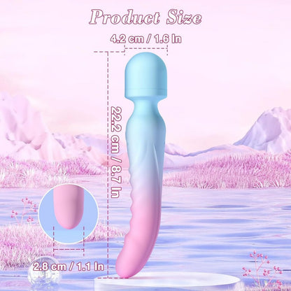 Pink and blue handheld massager with measurements on a soft, blurred background